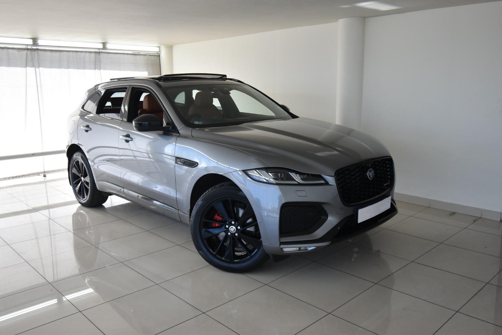 Original dealer photo of Jaguar with showroom background